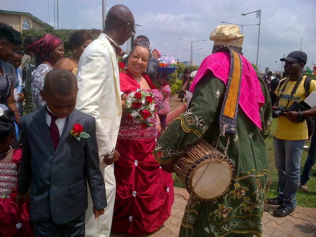 Wedding celebration with traditional attire and music.