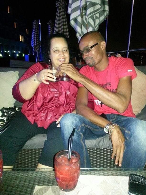 Friends toasting with drinks at a party.