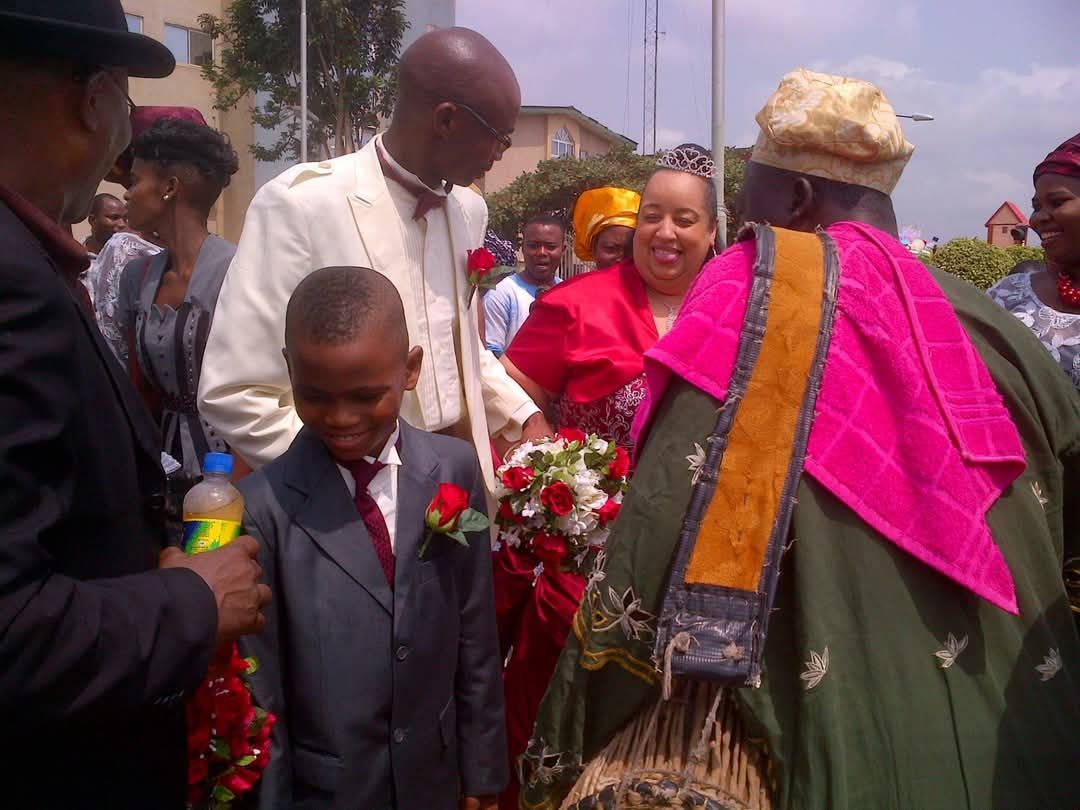 Celebration with wedding attire and flowers.